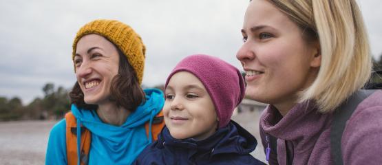 Two woman and a child on a beach