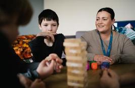 Two people with building blocks