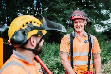 Two workers with protective equipment