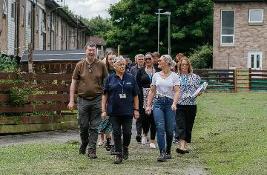 Community action team walking towards the camera