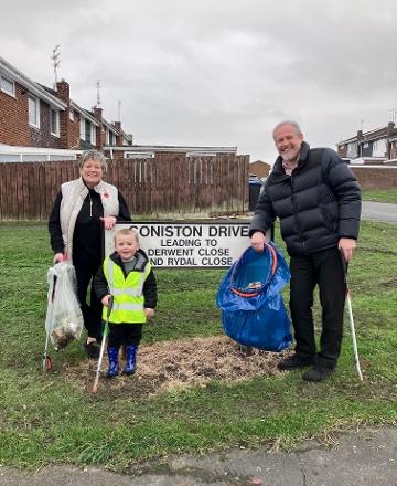 Alfie with his grandmother Gwyneth and Cllr Mark Wilkes picking litter